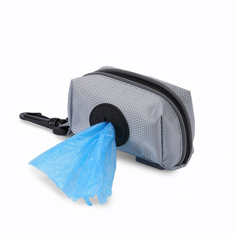 Distributeur de sac poubelle pour débris animaux